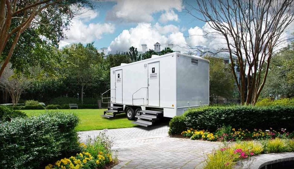 A picture of shower trailer in open area